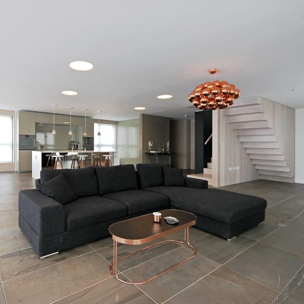 Interior view of a modern, open plan penthouse.